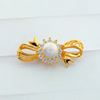 Picture of Dainty Sunflower Bow Brooch Gold Plated with White Pearl