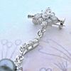 Picture of Sun Dangle Drop Brooch Rhodium Plated with Black Pearl