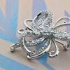 Picture of Small Spiral Bloom Flower Brooch Rhodium Plated