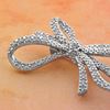 Picture of Small Double Ribbon Bow Brooch Rhodium Plated