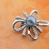 Picture of Small Modern Ribbon Brooch Rhodium Plated