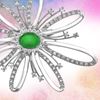 Picture of Starburst Flower Ribbon Brooch Rhodium Plated