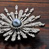 Picture of Large CZ Sunshine Brooch Rhodium Plated