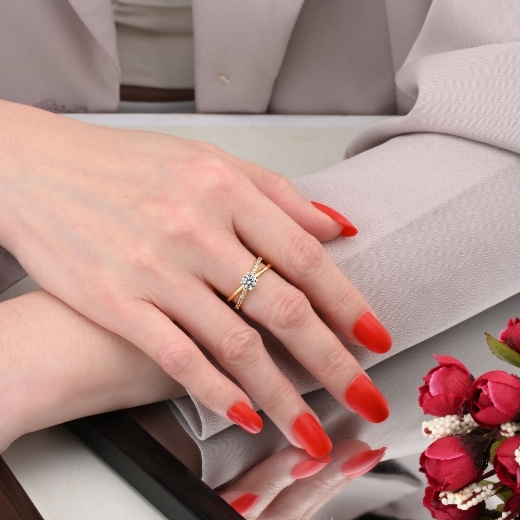 women criss cross engagement ring