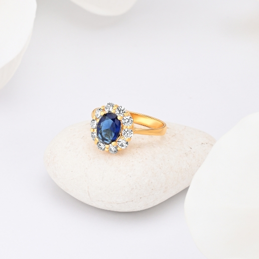gold plated halo ring with blue cz