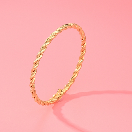gold plated twist bangle