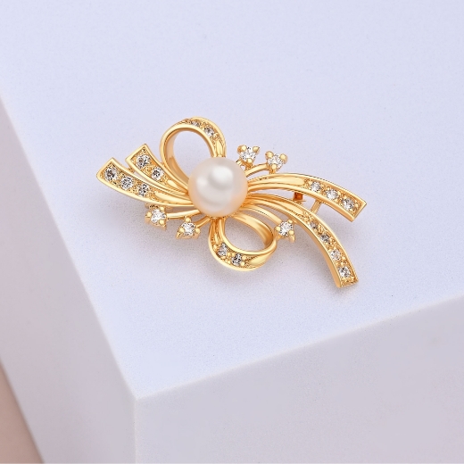 gold plated bow brooch pearl